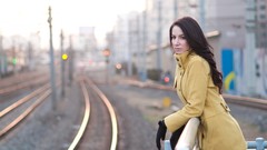 Woman brunettes railroad tracks