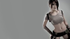 Woman brunettes tomb raider lara croft cosplay grey background 