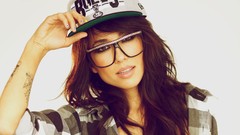 Woman cap close-up glasses white background faces tattoos brown 