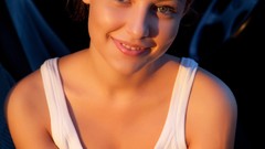Woman cars close-up faces sitting t-shirts long hair blue eyes 