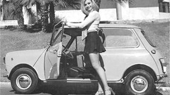 Woman cars grayscale miniskirts