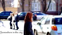 Woman cars roads cityscapes