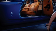 Woman cars Rolls Royce