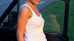 Woman cars stomach faces t-shirts outdoors long hair doors 