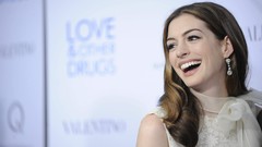 Woman Celebrity laughing anne hathaway