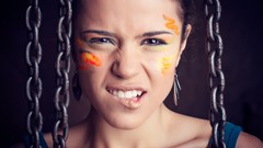 Woman chains brunettes face paint