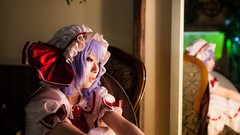 Woman chairs wings dress hats socks Vampires red eyes sitting 