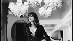 Woman chandelier sitting Actress grayscale open shirt Rashida 
