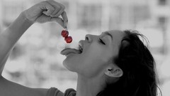 Woman cherries brunettes rosario dawson selective coloring