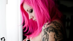 Woman chest tattoos pink hair magazines bra nude