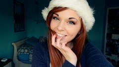 Woman Christmas smiling green eyes redheads santa claus hat 