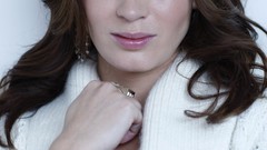 Woman cleaning cardigan emily blunt