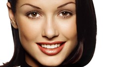 Woman close-up Bridget Moynahan Actress smiling brown eyes 