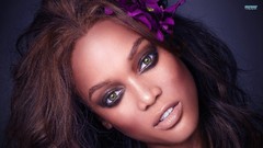 Woman close-up brunettes models flower in hair tyra banks