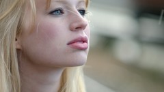 Woman close-up faces blondes blue eyes