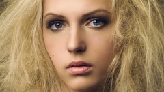 Woman close-up faces blondes blue eyes