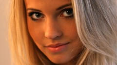 Woman close-up faces blondes blue eyes Norwegian Emilie Voe 