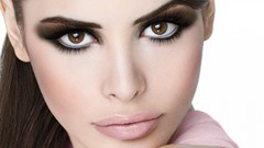 Woman close-up faces brown eyes