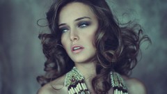 Woman close-up faces brunettes curly hair