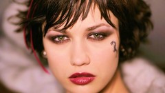 Woman close-up faces earrings green eyes short hair hitman 