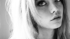 Woman close-up faces freckles grayscale