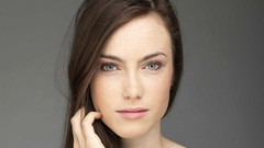 Woman close-up faces green eyes brunettes freckles