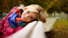 Woman close-up faces sitting coat outdoors blondes scarfs long 