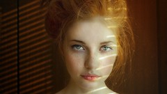 Woman close-up faces sunlight freckles redheads pale skin 