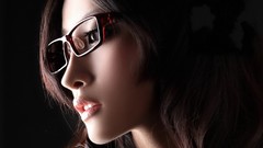 Woman close-up glasses faces asians brown eyes brunettes pale 