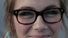 Woman close-up glasses faces smiling portraits