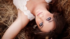 Woman close-up hay faces sunlight blue eyes brunettes pierced 