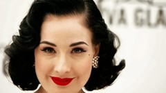Woman close-up models black hair red lipstick Dita Von Teese