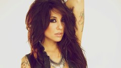 Woman close-up white background faces tattoos brown eyes 