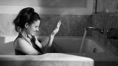 Woman closed eyes alison brie bathtubs greyscale