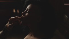 Woman closed eyes fingers on lips Aleksandr Mavrin