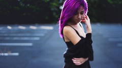 Woman closed eyes purple hair