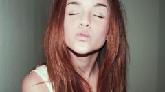 Woman closed eyes redheads