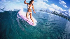 Woman clouds bikini waves