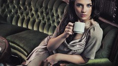 Woman coffee sitting couch indoors brunettes models