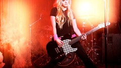 Woman concert Avril Lavigne guitars blondes microphones