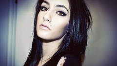 Woman corner brown eyes piercings black hair Lexi