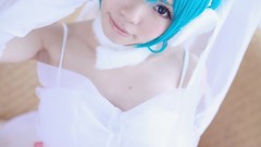 Woman cosplay vocaloid hatsune