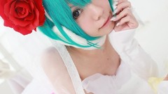 Woman cosplay vocaloid hatsune