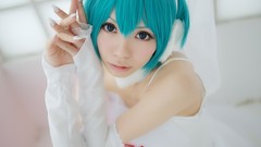 Woman cosplay vocaloid hatsune