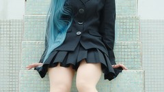 Woman cosplay vocaloid hatsune