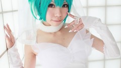 Woman cosplay vocaloid hatsune
