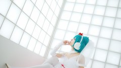 Woman cosplay vocaloid hatsune