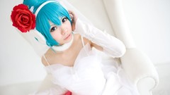 Woman cosplay vocaloid hatsune