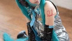 Woman cosplay vocaloid hatsune