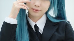 Woman cosplay vocaloid hatsune